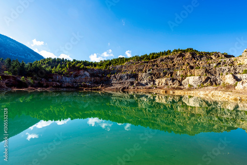 Crystal Clear Reflection on Quarry Lake in Evia