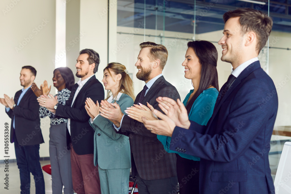 Happy multiethnic positive team employees applauding in office, congratulating team, job success, celebrating teamwork business achievement, clapping acknowledgement, people meeting to brainstorm Happy multiethnic positive team employees applauding in office, congratulating team, job success, celebrating teamwork business achievement, clapping acknowledgement, people meeting to brainstorm