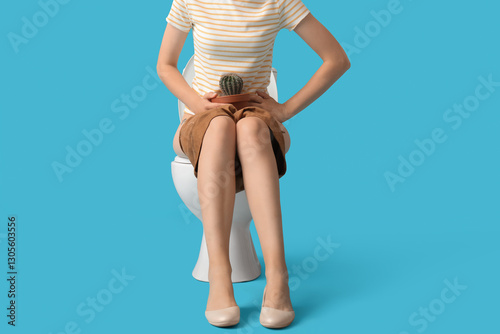 Young woman with cactus suf...