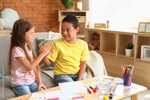 Cute little children giving...