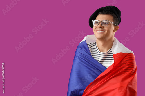 Young man with flag of Fran...