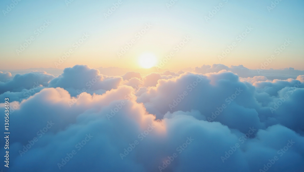 Fototapeta premium Majestic sunrise above fluffy clouds in a clear blue sky