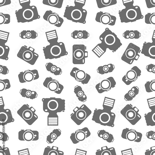Chaotic seamless pattern from cameras icons or symbols