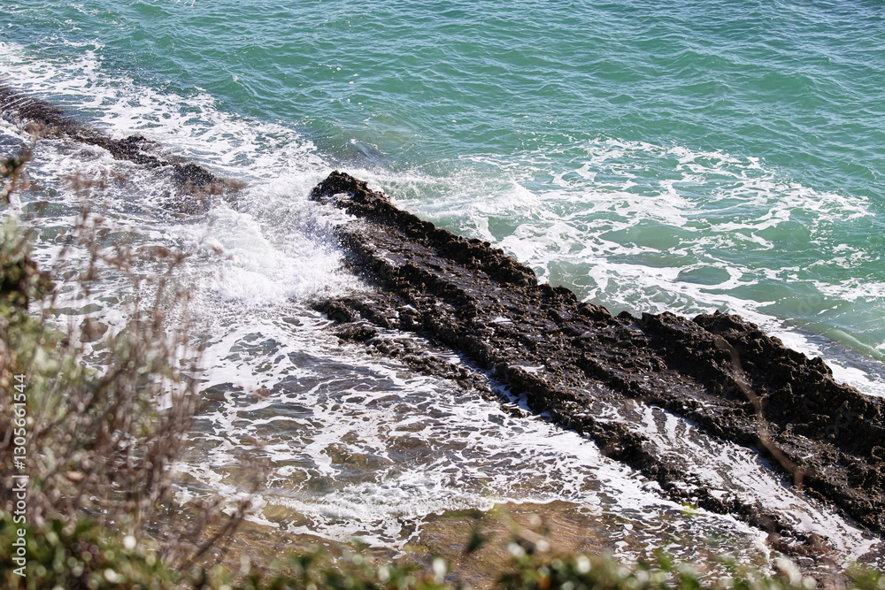 Fototapeta premium Rocky coast next to the sea.
