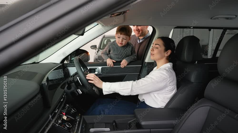 Family exploring features of a new right-hand drive car Family exploring features of a new right-hand drive car