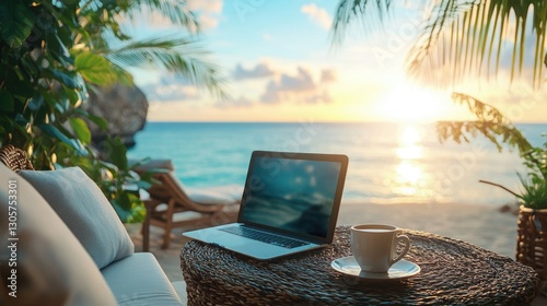 outdoor office or workspace with laptop and coffee cup at sea beach on summer holiday.	