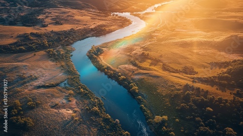 Wallpaper Mural Rainbow stretching over winding river at sunset, warm golden light, rich earthy tones, and tranquil reflective scenery, birdâ€™s-eye view. Torontodigital.ca
