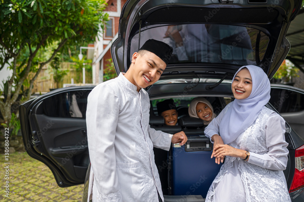 Asian Muslim family ready to mudik or travel to hometown by car. Concept of Eid Al Fitr, Idul Fitri, Lebaran, and Ramadan Mubarak celebration