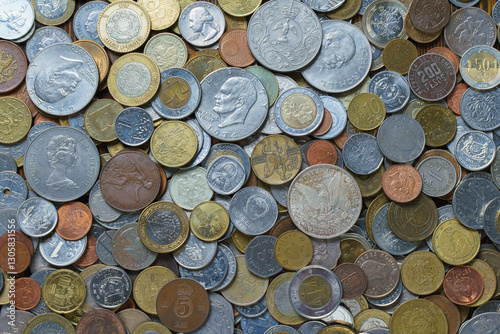 close-up view of different types of coins, large and small, from different countries and different denominations, foreign currency, exchange photo