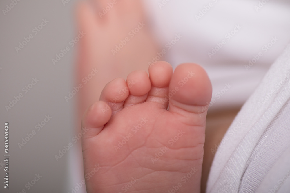 Little human newborn baby feet details close up Little human newborn baby feet details close up