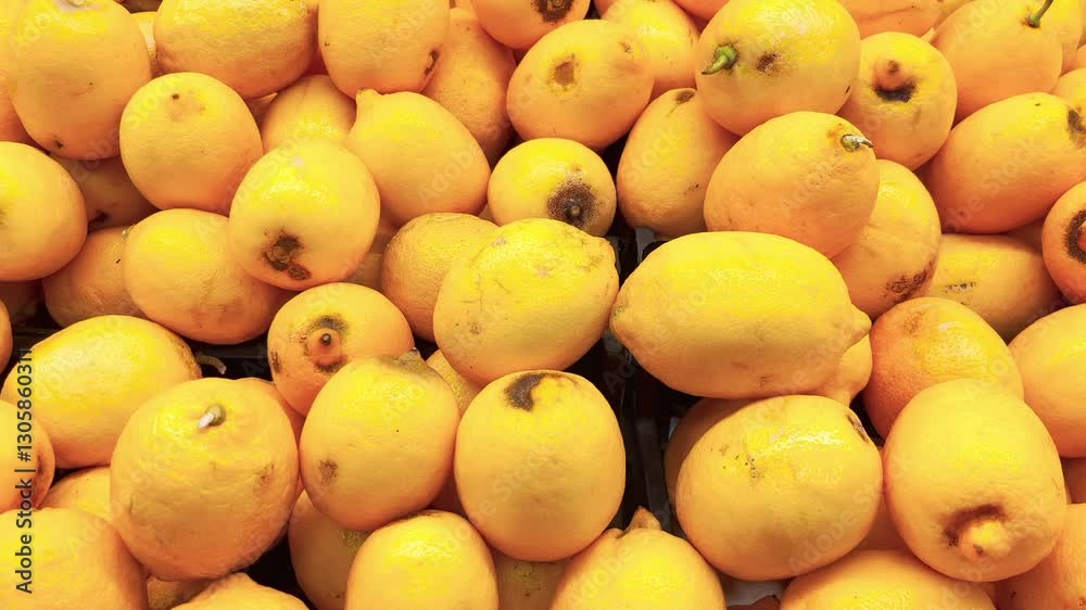 Lemons on a supermarket counter. (4k video) Lemons on a supermarket counter. (4k video)