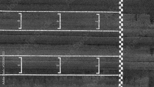 Obraz na płótnie Start or finish line on car race, Start and finish line racing, Grid start race track, Top view textured and background grid start on the asphalt road race track abstract. w salonie