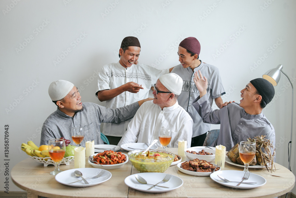 Portrait Of Multi Generation Muslim Family Laughing Together With Indonesian Traditional Food On The Table. Family Togetherness. Portrait Of Multi Generation Muslim Family Laughing Together With Indonesian Traditional Food On The Table. Family Togetherness.