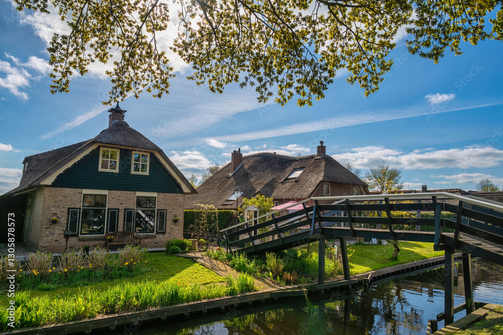 Giethoorn Netherlands, city skyline at canal and traditional house in Giethoorn village