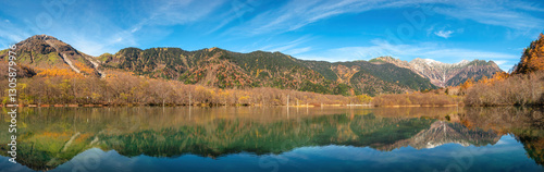 Obraz na płótnie Nature landscape panorama at Kamikochi Japan, autumn foliage season with pond and mountain w salonie