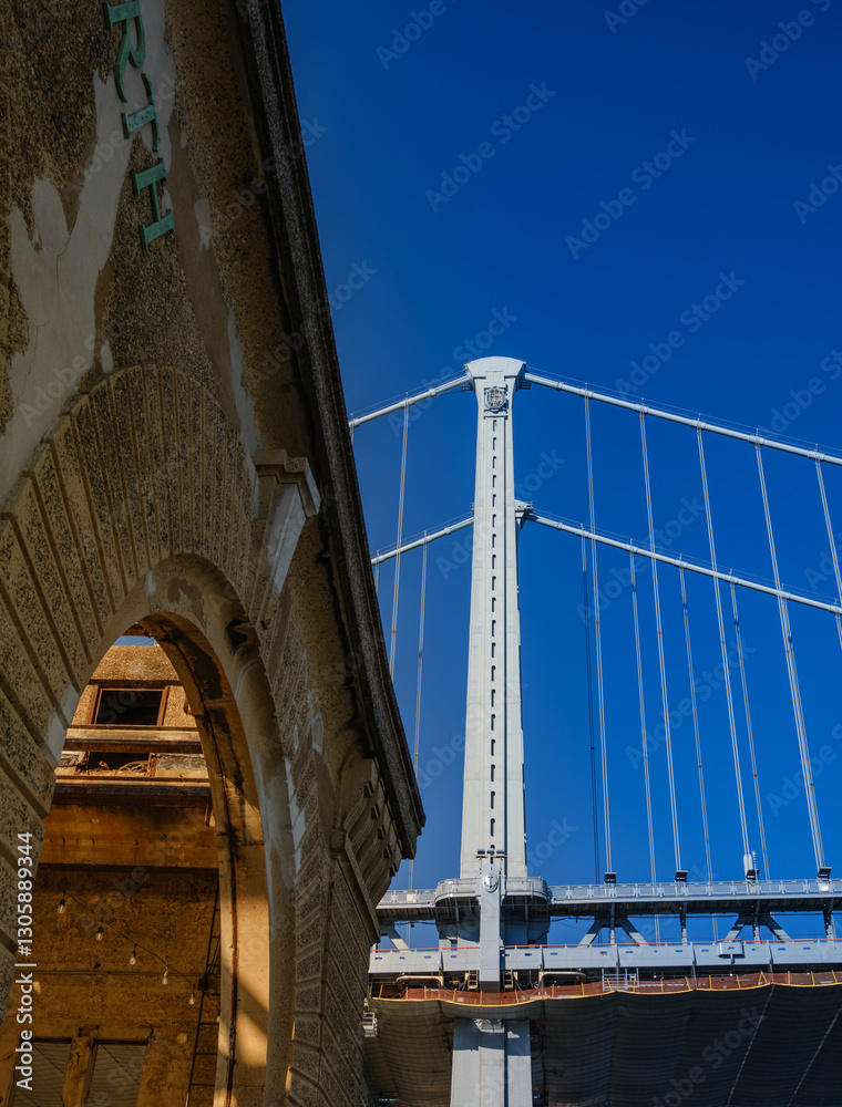 Fototapeta premium One of th two towers of the Ben Franklin Suspension Bridge that spans the Delaware River from Camden to Philadelphia. This tower is on the Philadelphia Side of the River