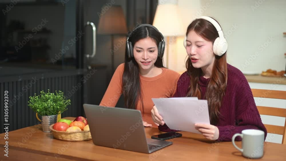 Teamwork and creativity with young adults collaborating on laptops and tablets in a cozy workspace. Perfect for education, innovation Teamwork and creativity with young adults collaborating on laptops and tablets in a cozy workspace. Perfect for education, innovation