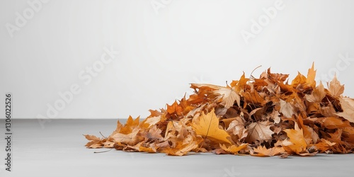 A beautiful arrangement of vibrant autumn leaves scattered on a light surface, symbolizing the seasonal change and nature’s transformation during fall, evoking nostalgia.