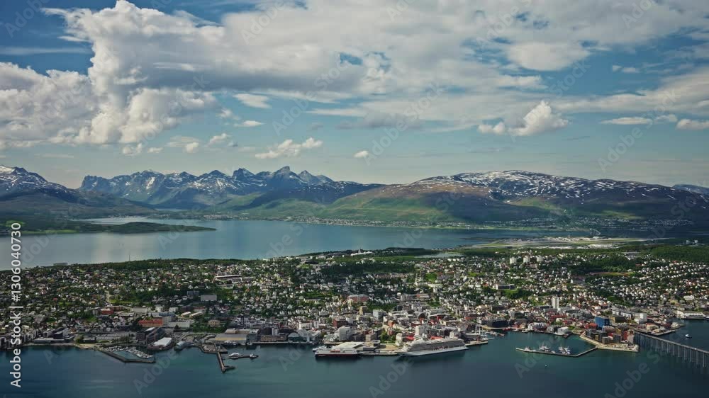 Static shot of Tromso, Norway from a high viewpoint.
High view of the nordic city, the landscape and the beautiful Norwegian fjords. Static shot of Tromso, Norway from a high viewpoint.
High view of the nordic city, the landscape and the beautiful Norwegian fjords.