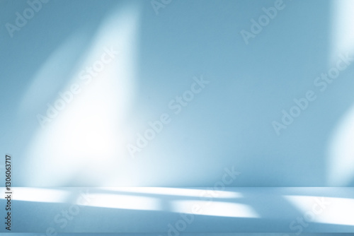Wall interior background  studio and backdrops show products. with soft light shadow from window color blue and white. background for text insertion and presentation of product 