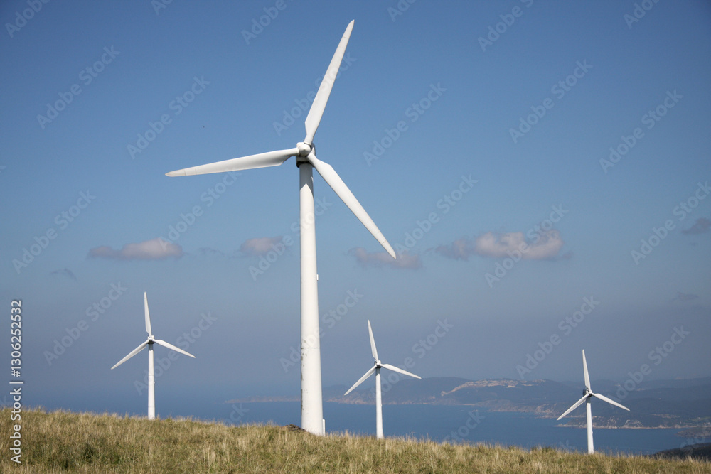 Many wind turbine in meadow. Wind turbines installed in open areas. Wind turbines as alternative energy sources Many wind turbine in meadow. Wind turbines installed in open areas. Wind turbines as alternative energy sources