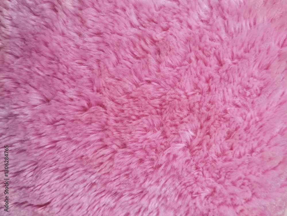 Pink fluffy towel fabric soft texture background Pink fluffy towel fabric soft texture background