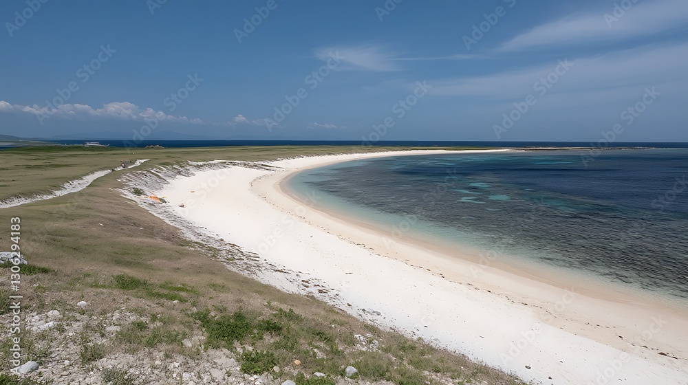 Fototapeta premium A Beautiful Coastline Featuring White Sand Beach and Blue Ocean Water