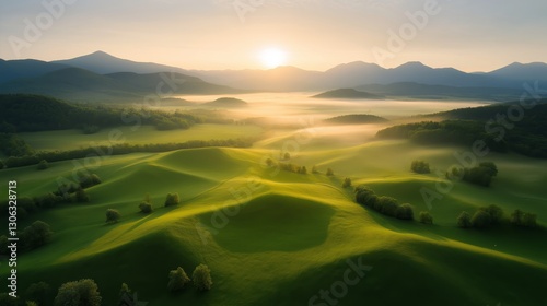 Fototapeta Naklejka Na Ścianę i Meble -  Dramatic sunrise over the rolling hills of Poland in May creating a serene landscape