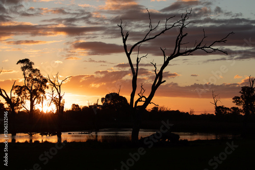 Sunset in country Victoria. Magical orange sky and reflection in the water. photo