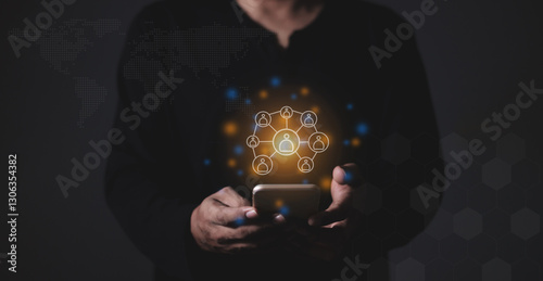 Young man hand using smartphone to Interconnect, Interconnected Concept; People connect via wireless internet in a world of digital technology and communications that connect freely around the world
