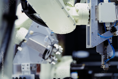 Obraz na płótnie robot arm working in car factory w salonie