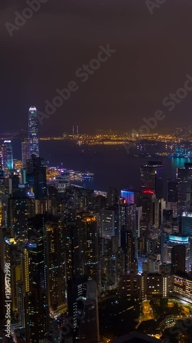 Wallpaper Mural night illumination famous harbor hong kong cityscape aerial vertical timelapse panorama 4k hong kong Torontodigital.ca