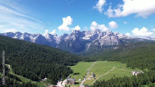 DRONE AERIAL FOOTAGE: Lake Misurina and Mount Sorapiss in the Dolomites within the Veneto region of northern Italy. Situated in the comune of Cortina d'Ampezzo. 