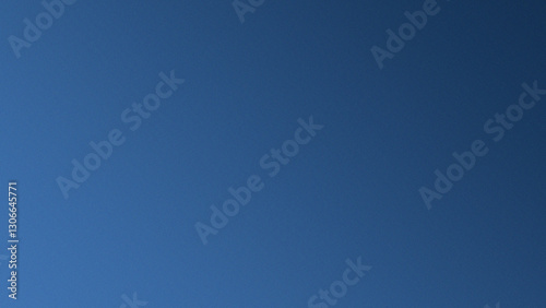 Abstarct background with a gradient of dark blue and light blue with a noise effect, suitable as a background for designs.