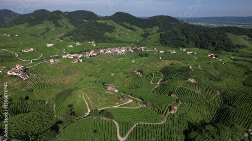 DRONE AERIAL FOOTAGE: Famous Prosecco Hills in Veneto wine region. The DOCG Cartizze Hills. The Cartizze area is located in the municipality of Valdobbiadene (Treviso, Italy).