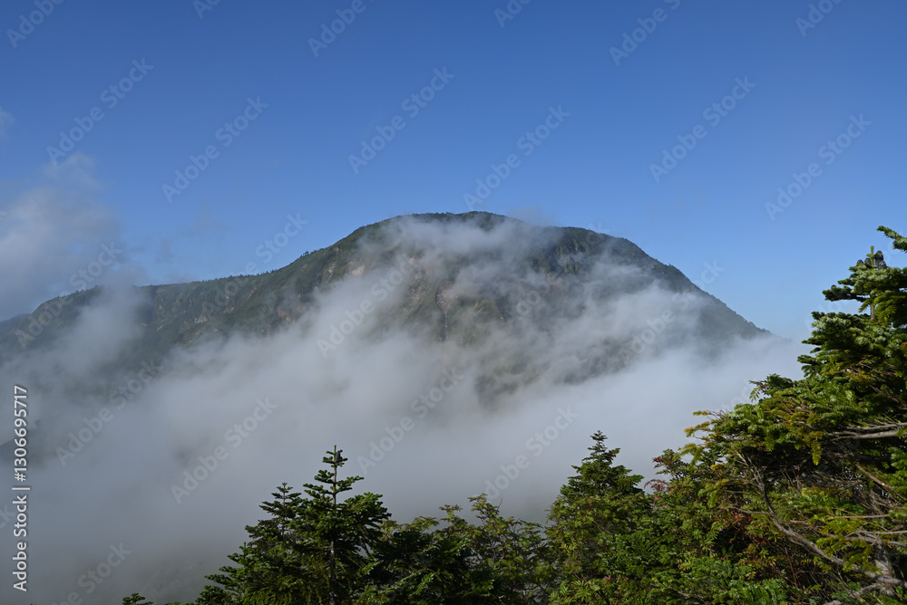 Fototapeta premium Climbing Mount Naeba, Niigata, Japan