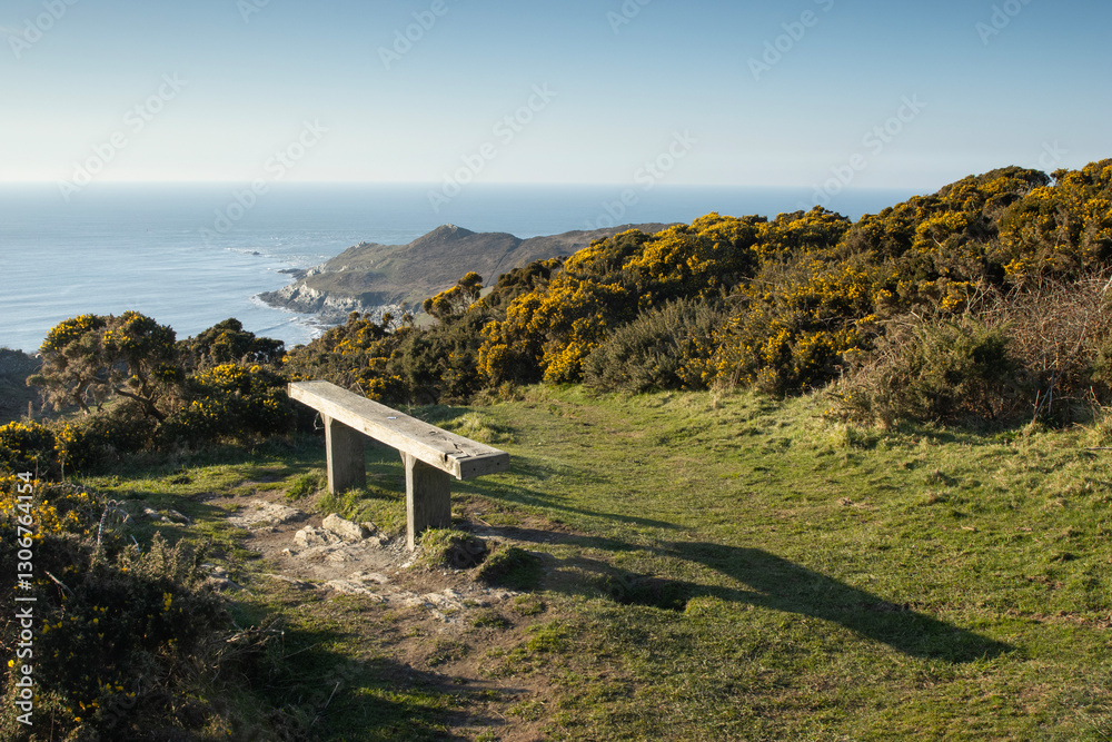 Seat overlooking headland of Mortehoe in North Devon