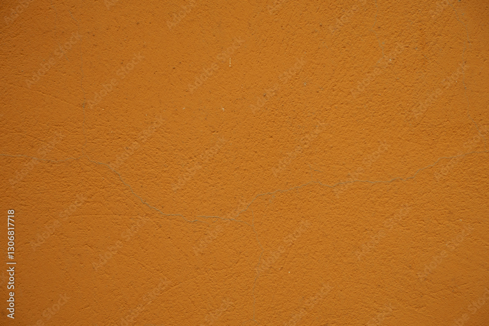 Close shot of bright orange painted wall Close shot of bright orange painted wall