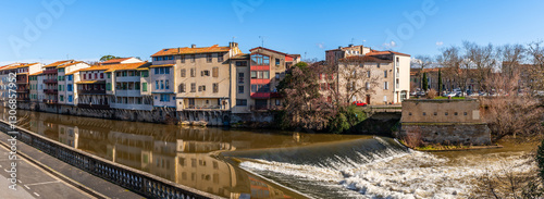Obraz na płótnie Facades of houses in the town of Castres on the Agout River in Occitanie, France w salonie