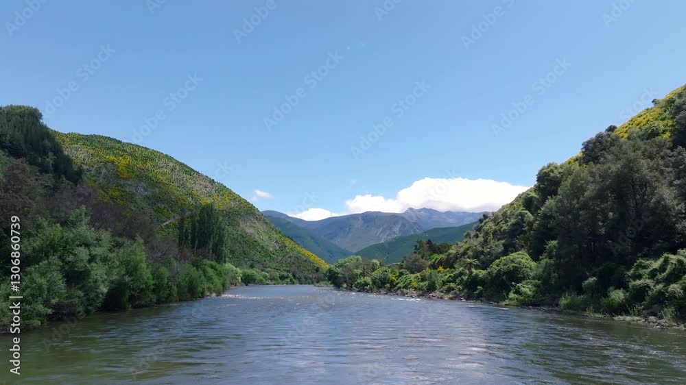 Low flying drone over the surface of the water flying over the Motueka river in New Zealand Low flying drone over the surface of the water flying over the Motueka river in New Zealand