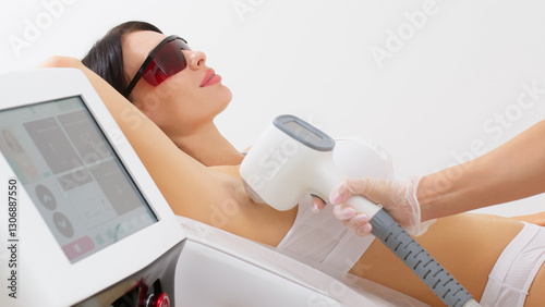 Flash diode laser hair removal in a cosmetologist's office, hair removal for smooth skin, laser procedure in a beauty studio or clinic, body care hair removal. Laser hair removal.