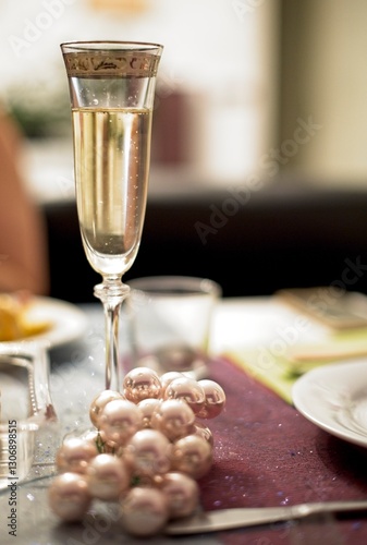 Beautiful glass of champagne on decorated table