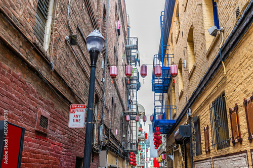 A view down a narrow alley  in Chinatown  in San Francisco in early springtime