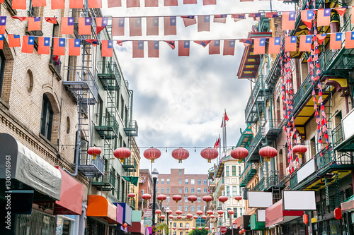 A view up a brightly coloured and decorated street  in Chinatown  in San Francisco in early springtime