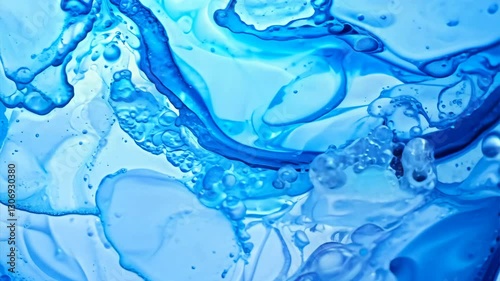 A mesmerizing close-up of a boiling liquid with dynamic swirling patterns, rich blue tones, and intricate bubbles forming, resembling a chemical reaction in motion.