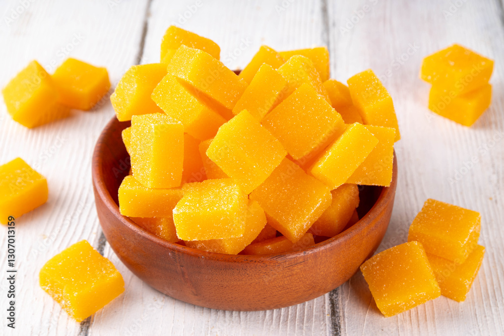 Dried mango cubes,organic mango fruit marmalade jelly candies without added sugar, healthy sweets for diet and healthy eating Dried mango cubes,organic mango fruit marmalade jelly candies without added sugar, healthy sweets for diet and healthy eating
