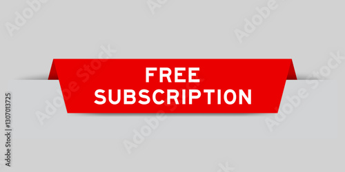 Red color inserted label with word free subscription on gray background