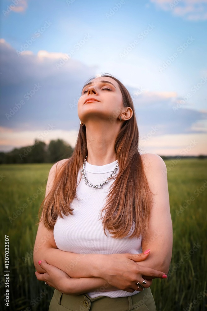 Beautiful girl in the field. Spring/Summer photo. Summer style, shades of clothes match the color of the environment. Beautiful girl in the field. Spring/Summer photo. Summer style, shades of clothes match the color of the environment.