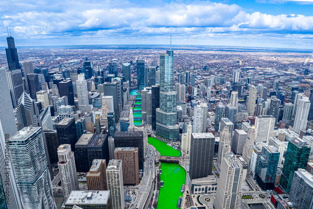 Fototapeta premium aerial view of Chicago River during St. Patrick's Day