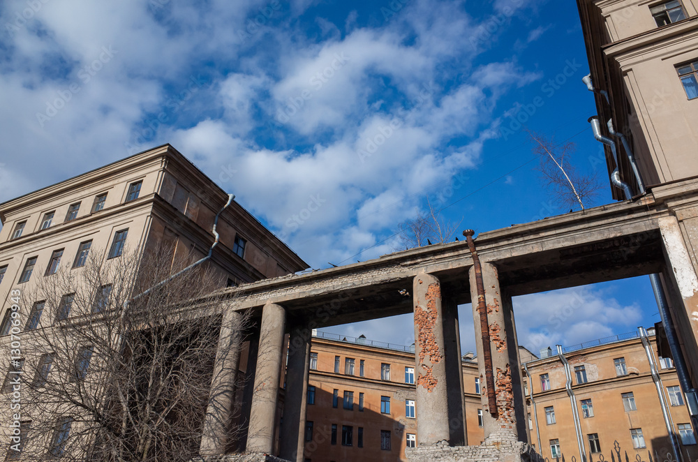 A historic damaged building with rusticated architectural details A historic damaged building with rusticated architectural details